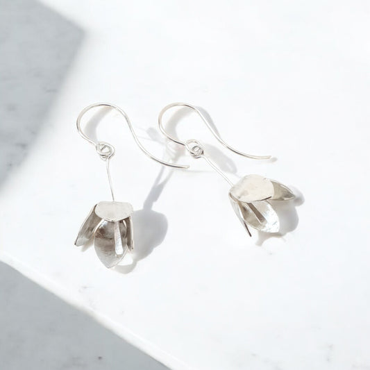 Sterling silver Whispering Lily Flower earrings by Aprilierre featuring delicate floral design and polished finish.