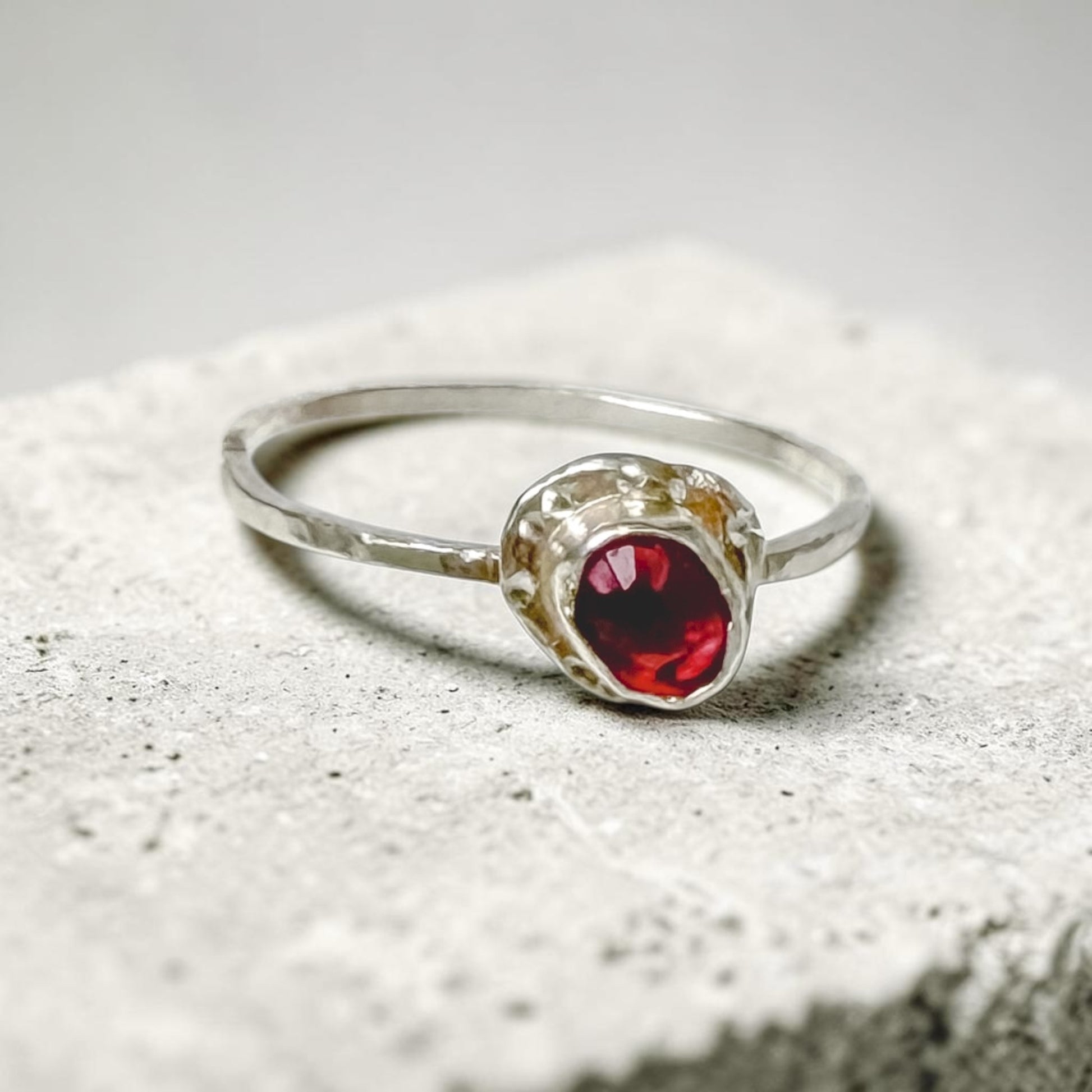 Sterling silver pink tourmaline ring by Aprilierre, size 9.25, featuring a vibrant raspberry pink gemstone setting.