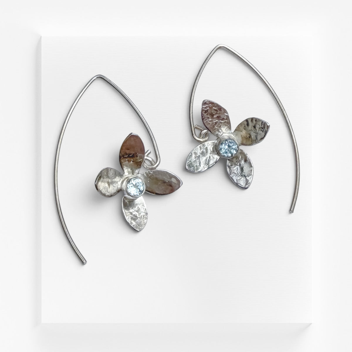 Eloquent Petals – Sterling Silver Earrings with Sky Blue Topaz