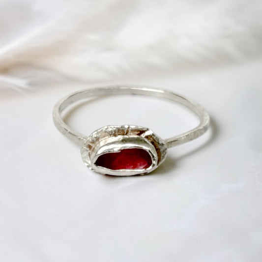 Sterling silver tourmaline ring with pink popsicle design by Aprilierre, featuring a vibrant pink gemstone and intricate band details.